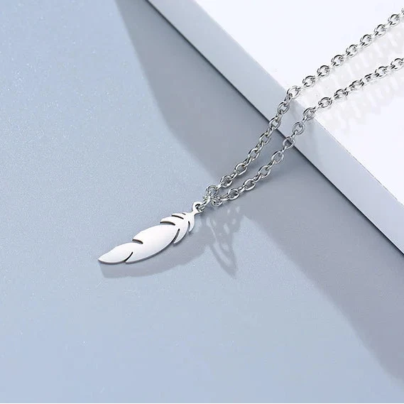 Discreet feather necklace and pendant for men