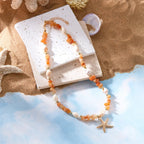 Women's shell pendant necklace in orange