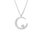Shiny necklace with star and moon pendant