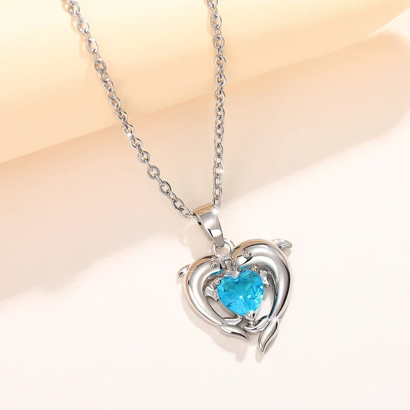 Timeless necklace with a double dolphin pendant