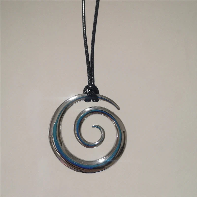 Long necklace with silver-toned spiral pendant