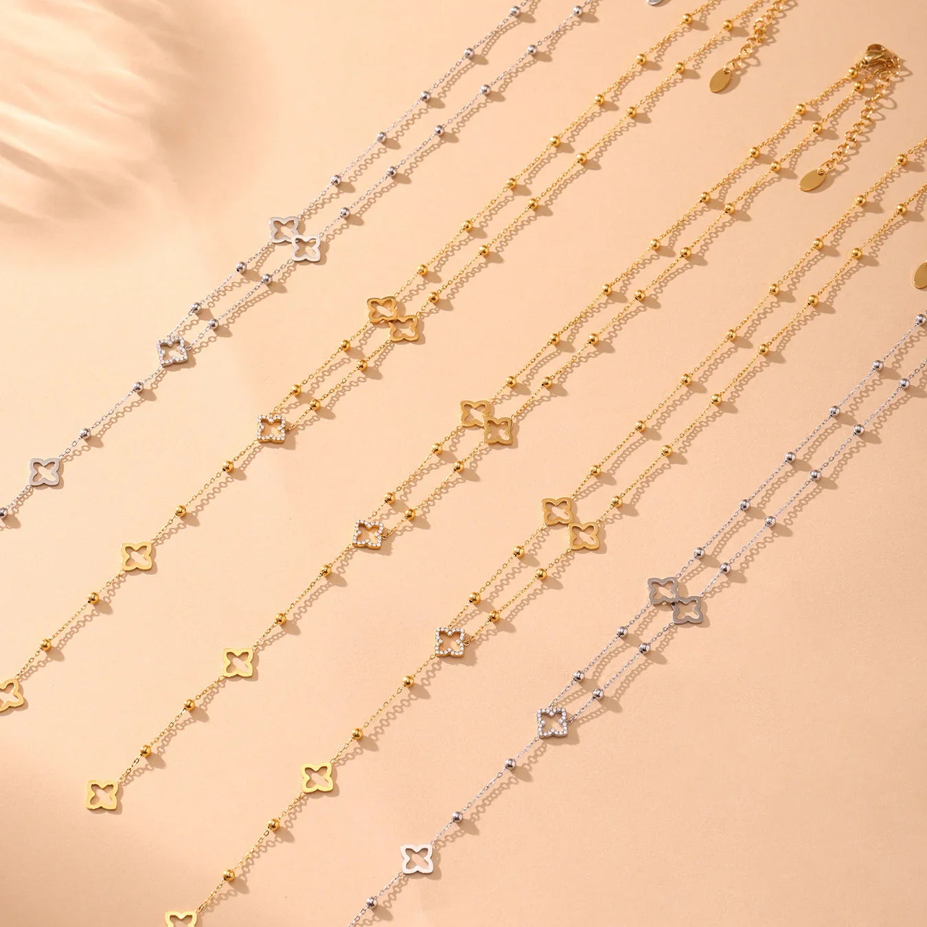 Long Necklace with Four-Leaf Clover and Gold Zircon Pendants