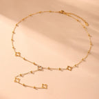 Long Necklace with Four-Leaf Clover and Gold Zircon Pendants