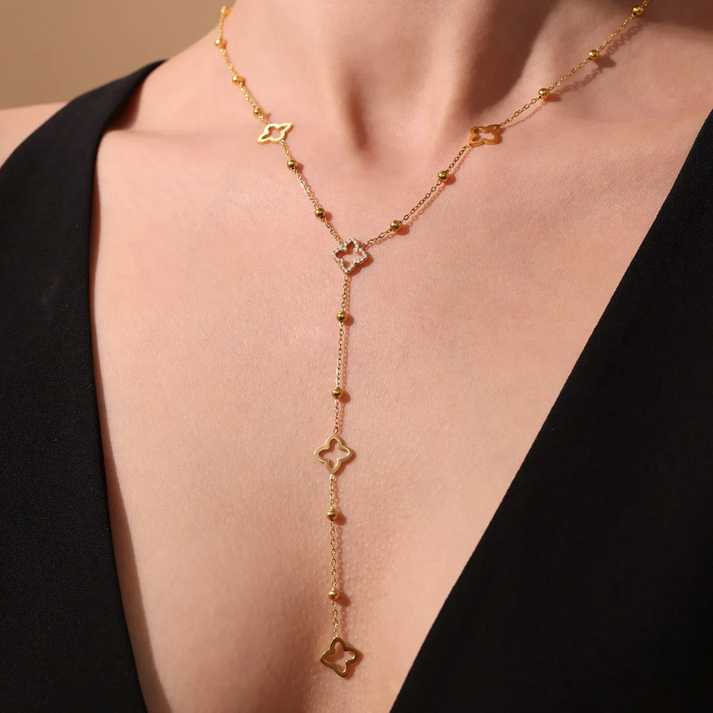 Long Necklace with Four-Leaf Clover and Gold Zircon Pendants