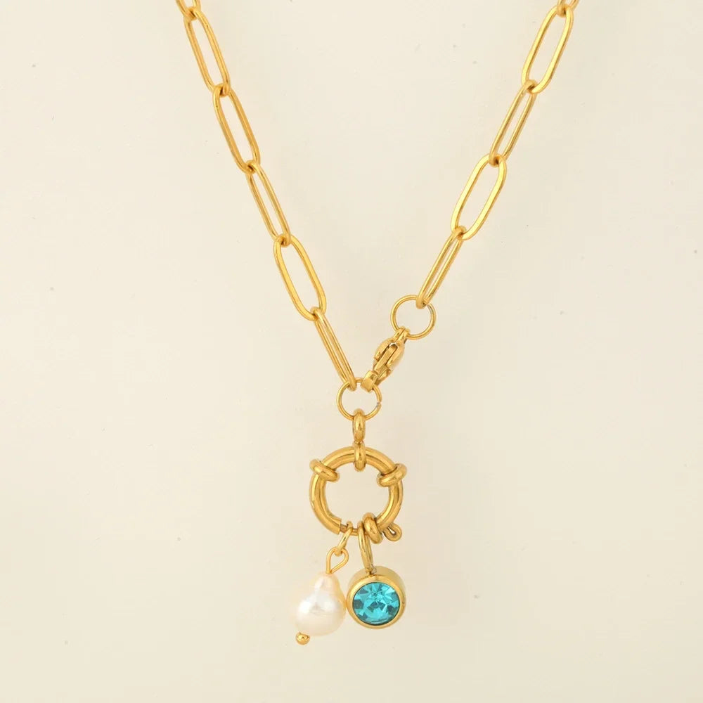 Link necklace with pearl pendant and December birthstone