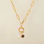 Link necklace with pearl pendant and May birthstone