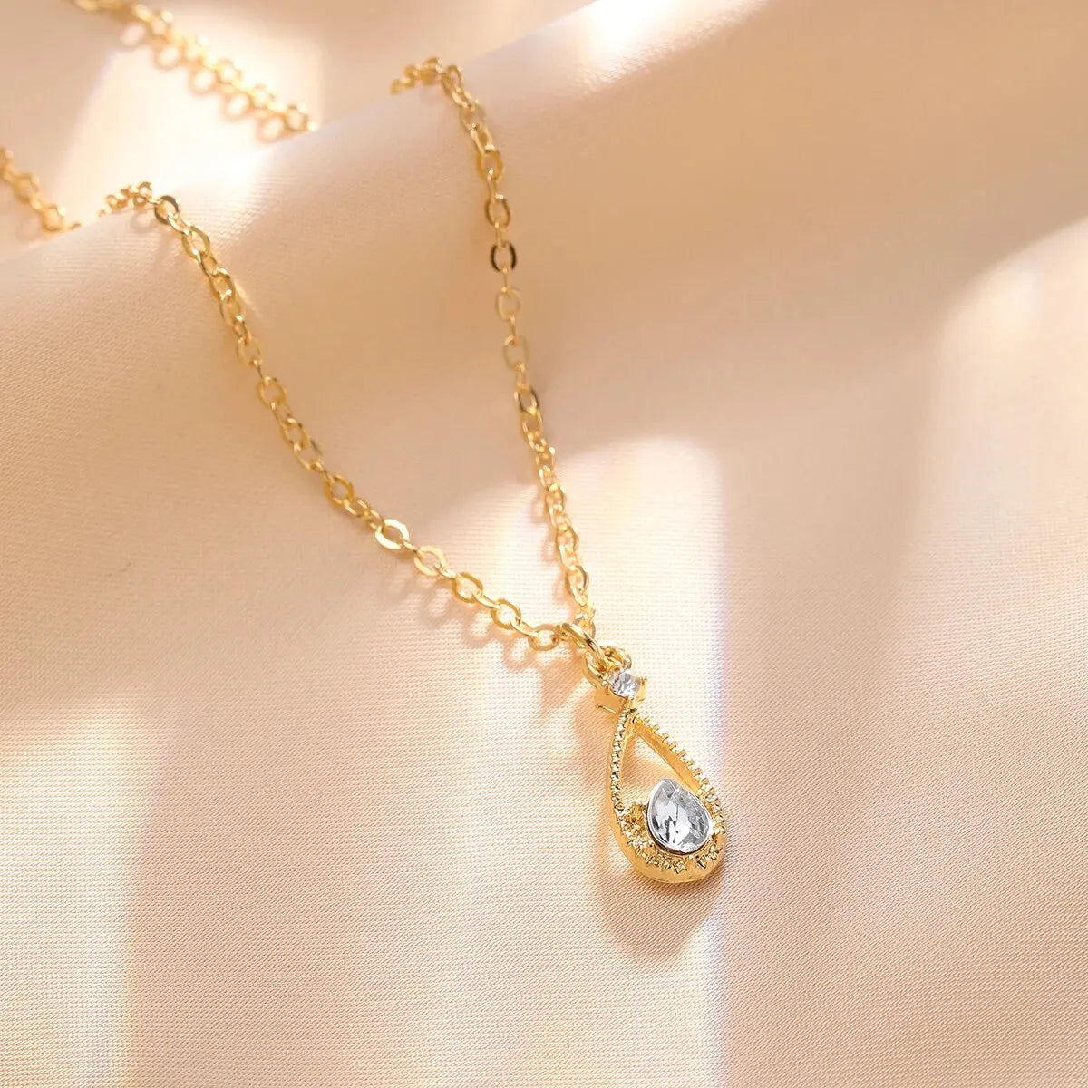 Fine Water Drop and Gold Pearl Pendant Necklace