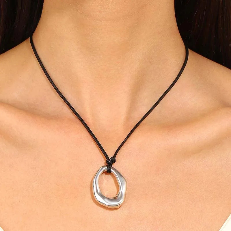 Hollow Water Drop Pendant Necklace black and silver cord