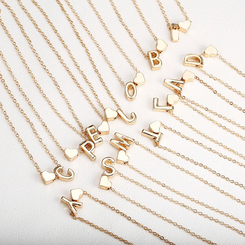 Women's necklace with initial and heart charm