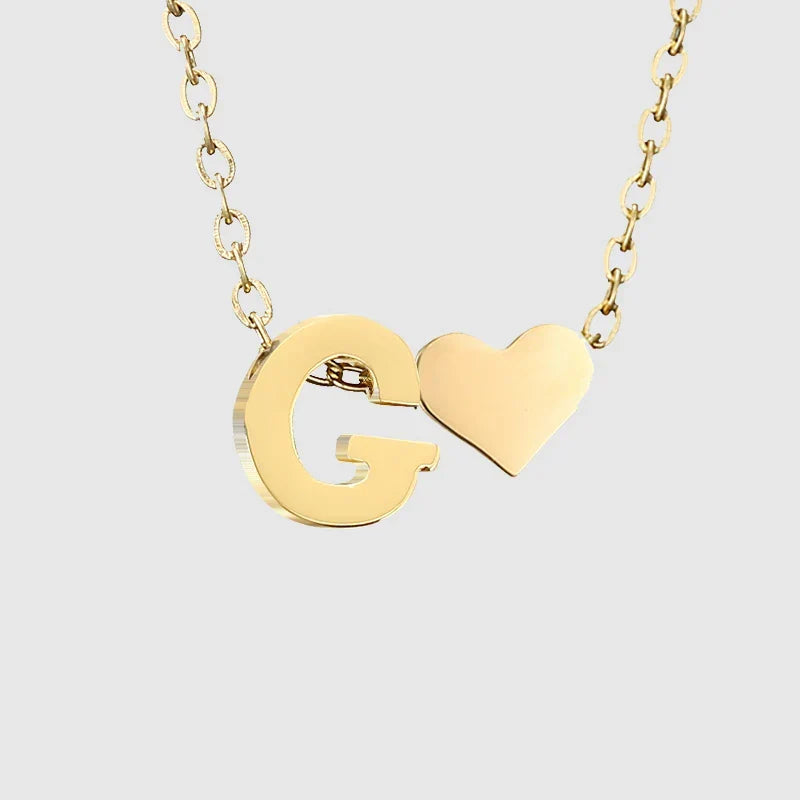 Women's necklace with heart pendant and initial letter