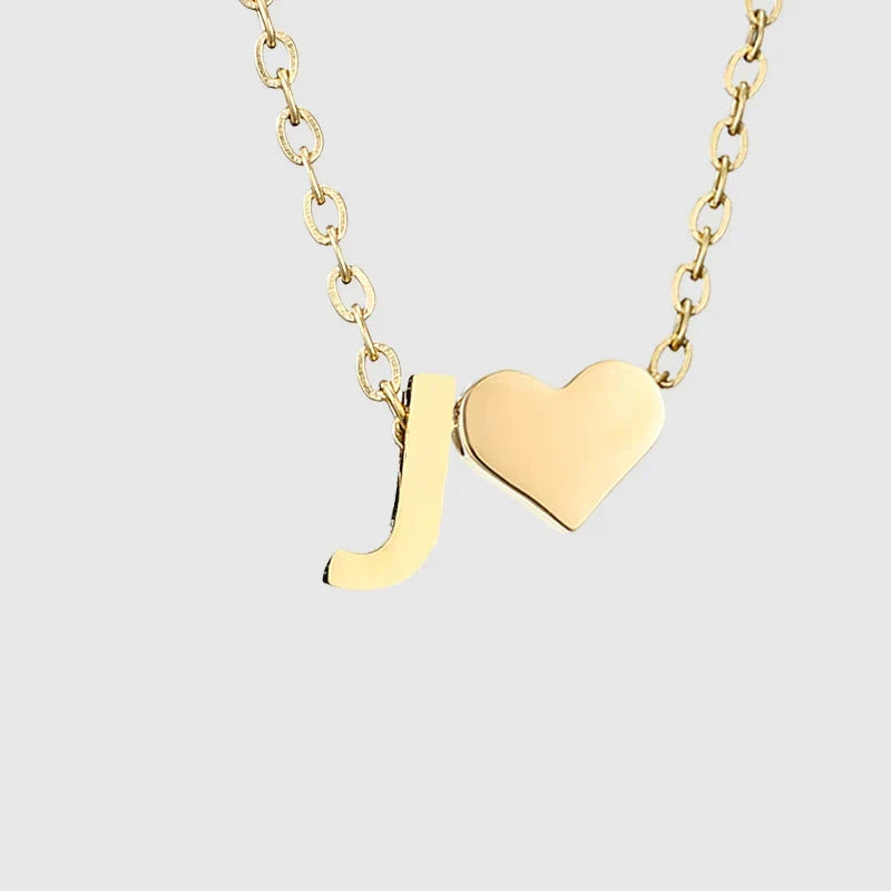 Women's necklace with heart pendant and initial letter