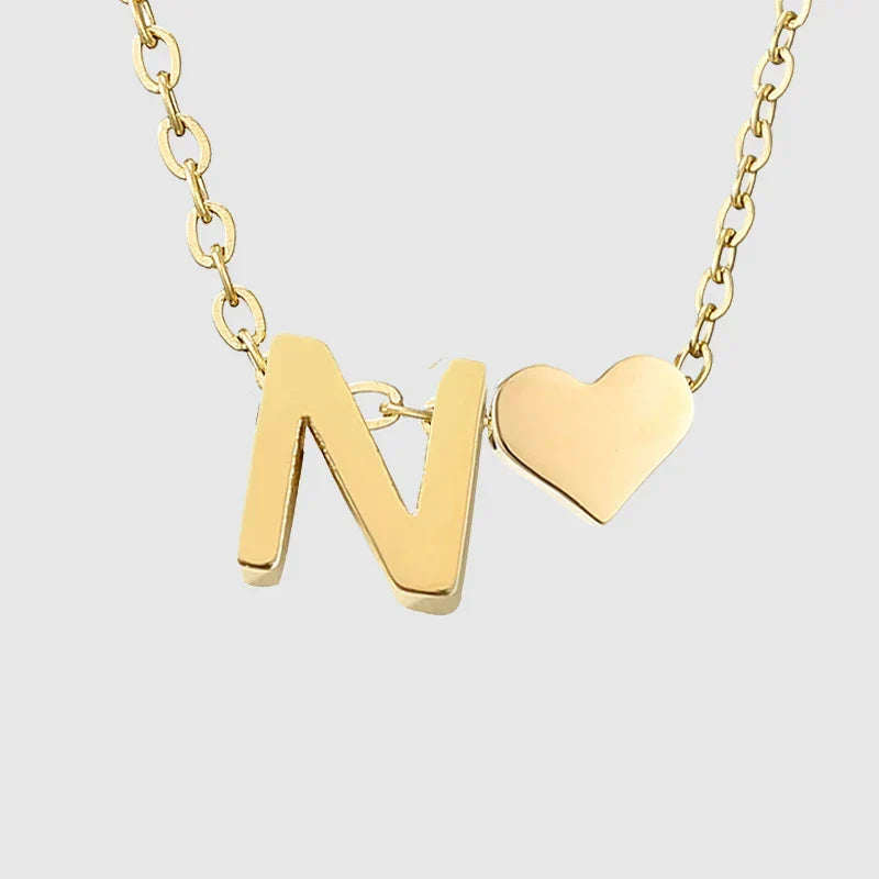 Women's necklace with heart pendant and initial letter