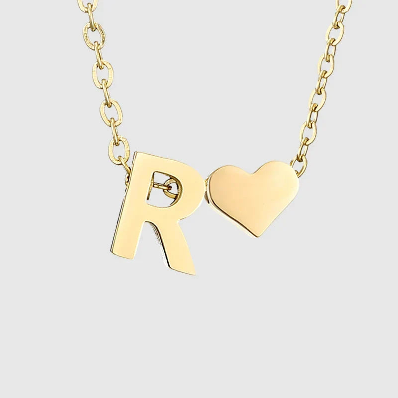 Women's necklace with heart pendant and initial letter