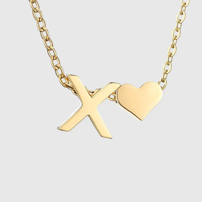 Women's necklace with heart pendant and initial letter