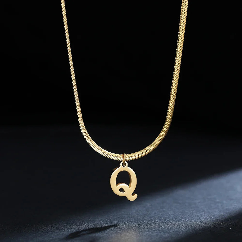 Women’s choker necklace with initial pendant q
