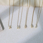 Women's choker necklace with minimalist initial pendant