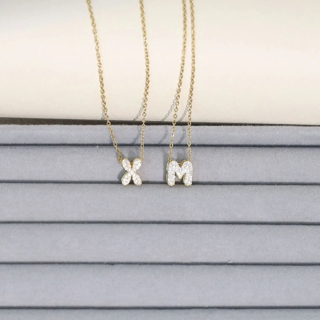Women's choker necklace with minimalist initial pendant