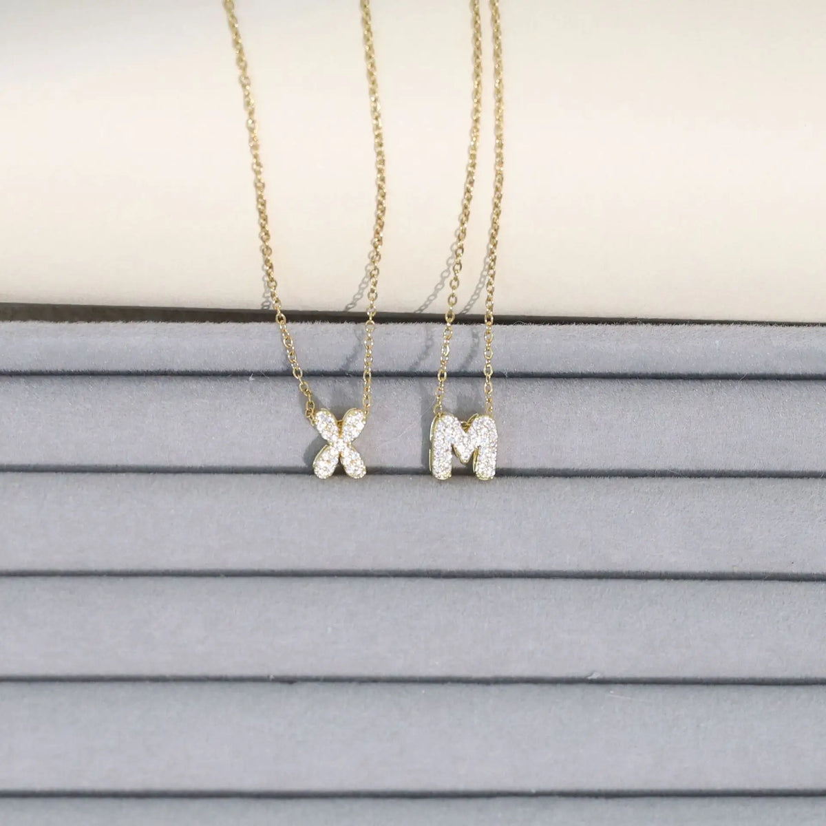 Women's choker necklace with minimalist initial pendant