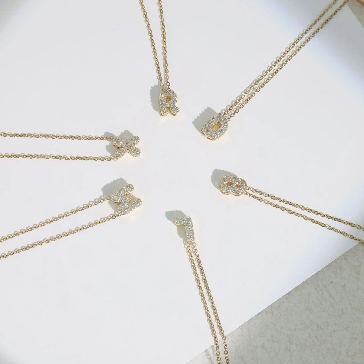 Women's choker necklace with minimalist initial pendant