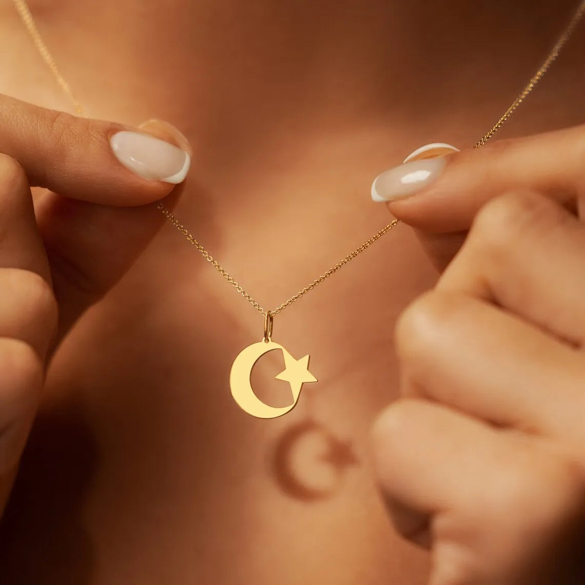 Women's necklace with symbolic Islamic crescent and star pendant in gold-tone Arabic style