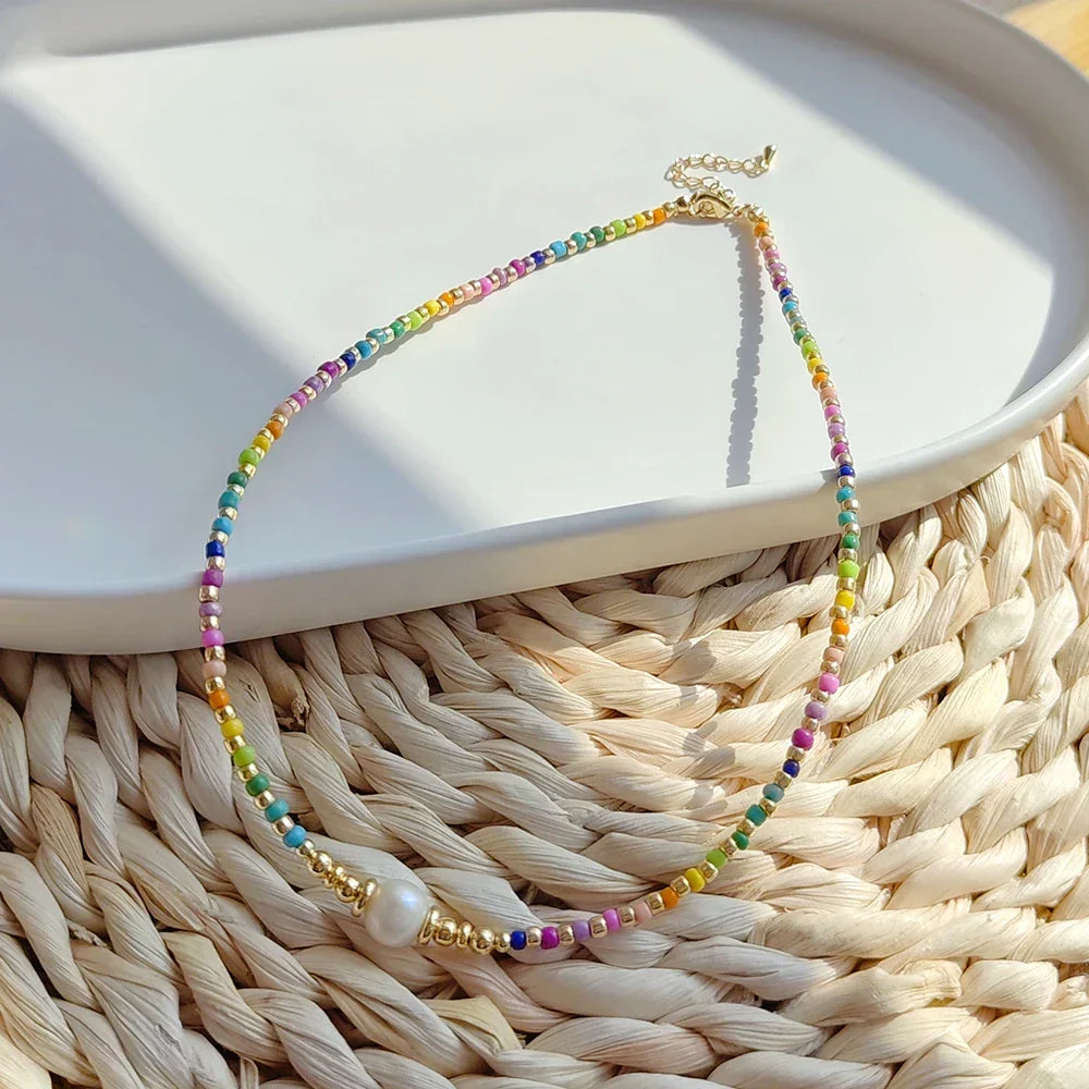Choker necklace with rainbow pendant and beads