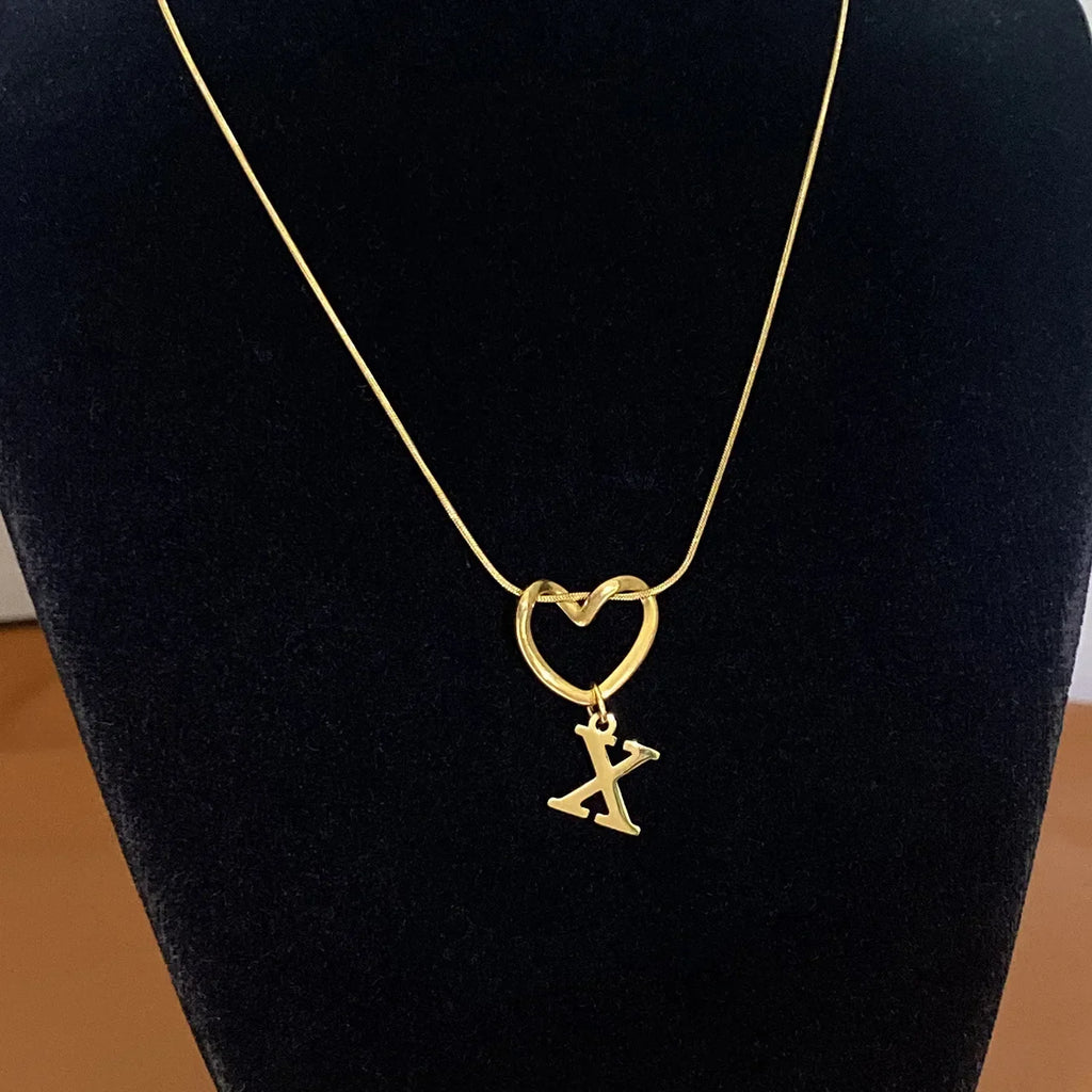Choker necklace with initial letter and heart pendant