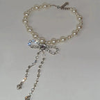 Choker necklace with a rhinestone bow tie pendant