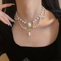 Choker Necklace with Baroque Style Pearl Pendants