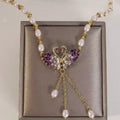 Purple double-swan heart-shaped necklace