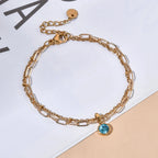 Double gold-tone bracelet with birthstone