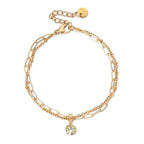 Double gold-tone bracelet with birthstone