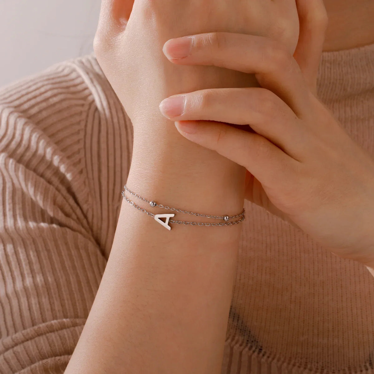 Double initial bracelet in gold and silver