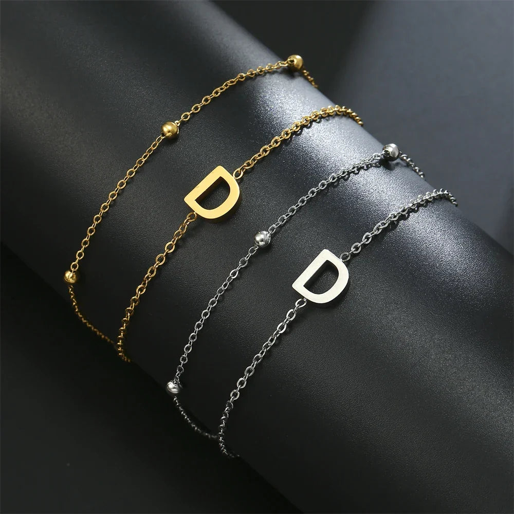 Double initial bracelet in gold and silver  d