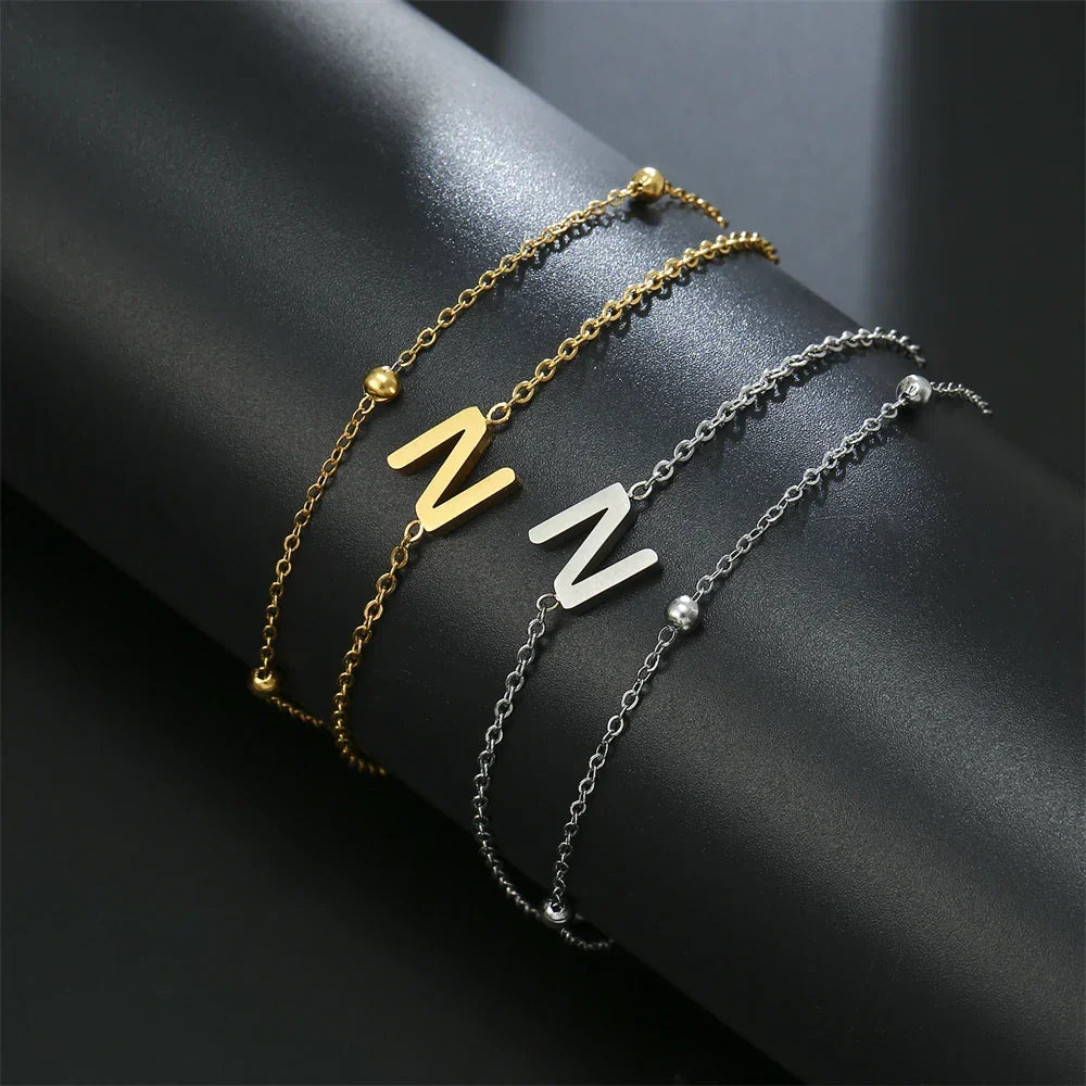 Double initial bracelet in gold and silver  n