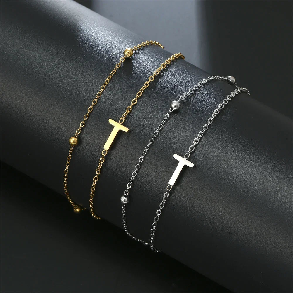 Double initial bracelet in gold and silver  t