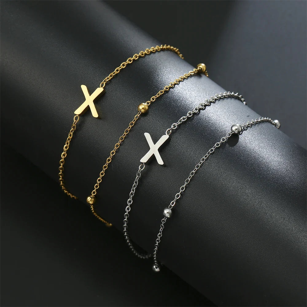 Double initial bracelet in gold and silver  x