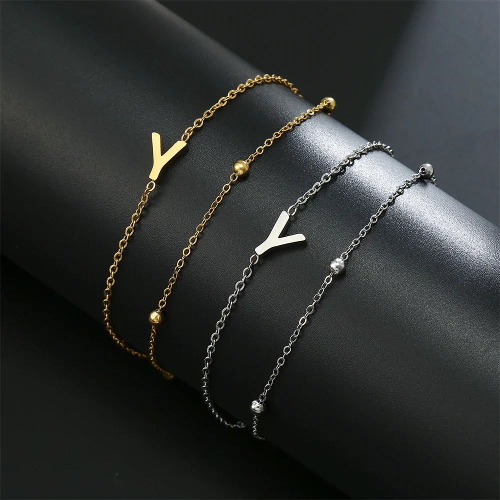 Double initial bracelet in gold and silver  y