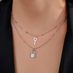 Double necklace with key and lock pendant in silver