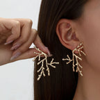 Large coral earrings for women in gold