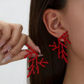 Large coral earrings for women in red