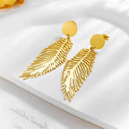 Large stylized feather earrings