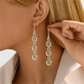 Long spiral drop earrings