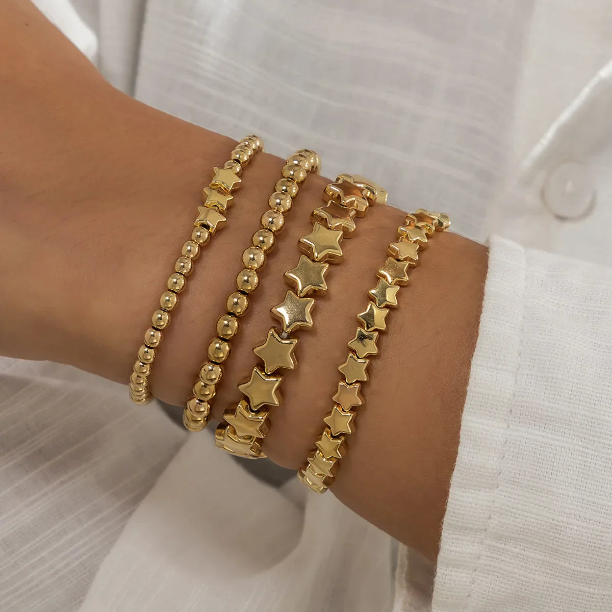 Set of 4 Gold Star Bracelets