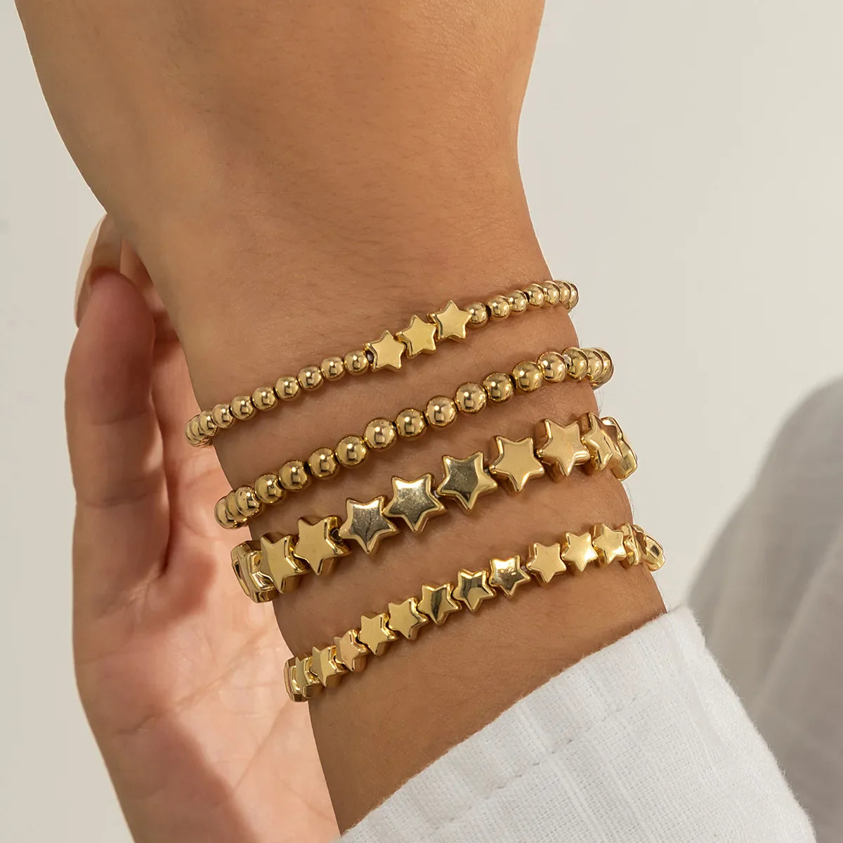 Set of 4 Gold Star Bracelets