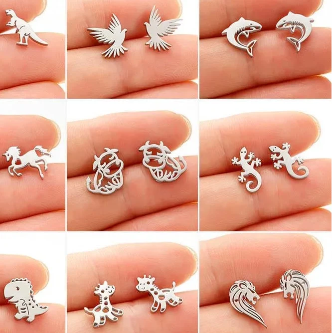 Small stud earrings with shark motif