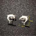 Small stud earrings with shark motif